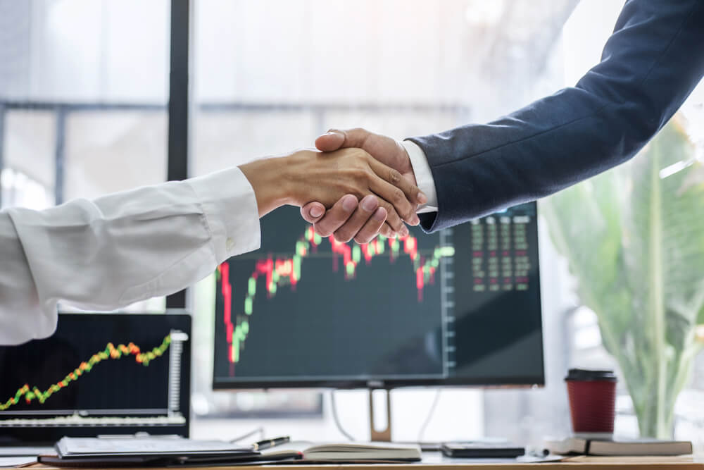 Business Handshake After a Good Deal of Trading
